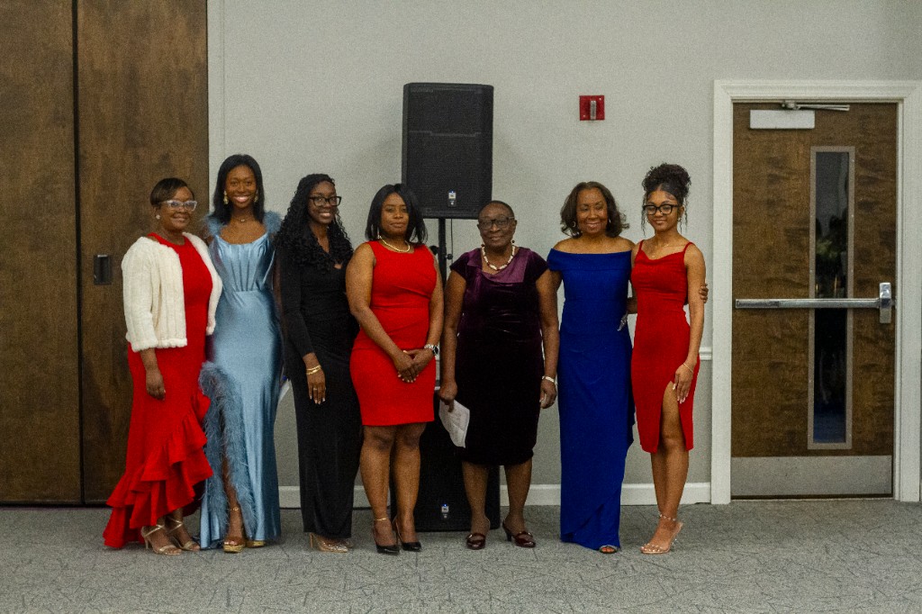 CACAO scholarship recipients and organizers posing together at an awards event